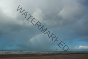 Kitesurfer onder de regenboog